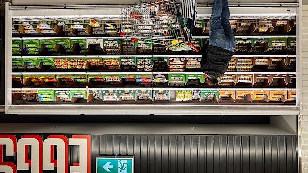 Egg cartons on a shelf in a Coles supermarket.