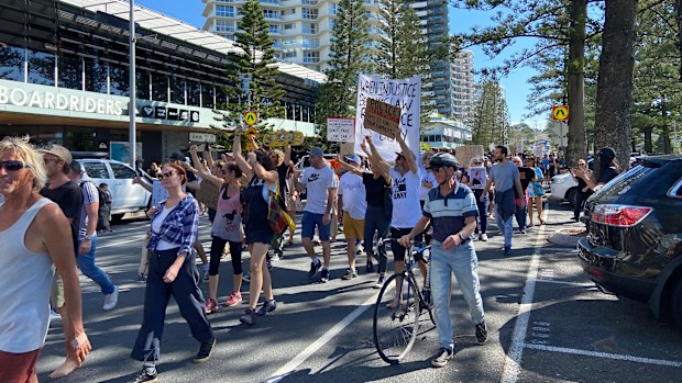 People gathered on Coolangatta Esplanade protesting an end to vaccinations and lockdown. 