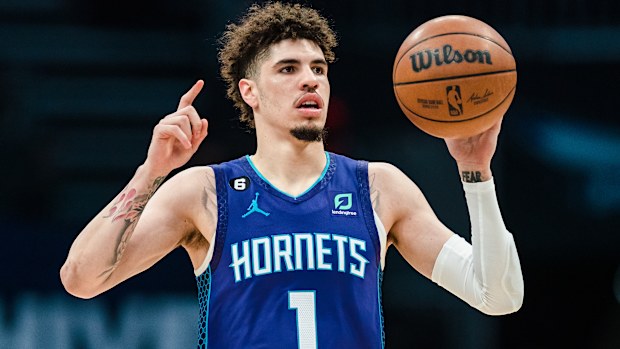 CHARLOTTE, NORTH CAROLINA - FEBRUARY 25: LaMelo Ball #1 of the Charlotte Hornets brings the ball up court against the Miami Heat during their game at Spectrum Center on February 25, 2023 in Charlotte, North Carolina. NOTE TO USER: User expressly acknowledges and agrees that, by downloading and or using this photograph, User is consenting to the terms and conditions of the Getty Images License Agreement. (Photo by Jacob Kupferman/Getty Images)