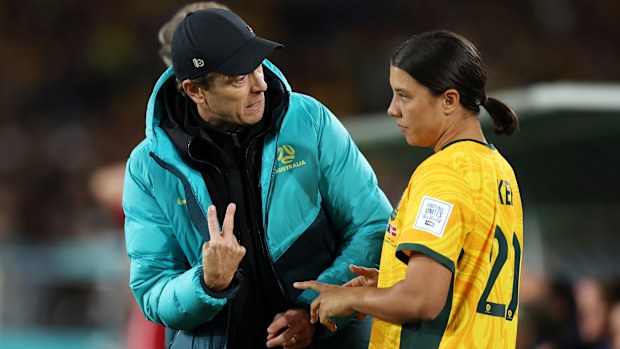 SYDNEY, AUSTRALIA - AUGUST 07: Sam Kerr of Australia is instructed by head coach Tony Gustavsson before brought in  during the FIFA Women's World Cup Australia & New Zealand 2023 Round of 16 match between Australia and Denmark at Stadium Australia on August 07, 2023 in Sydney / Gadigal, Australia. (Photo by Matt King - FIFA/FIFA via Getty Images)