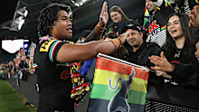 Brian To'o of the Panthers celebrates with fans.