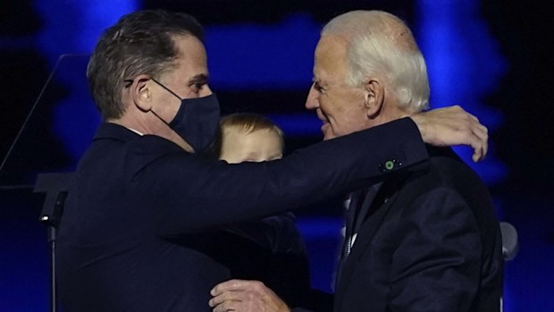 President-elect Joe Biden, right, embraces his son Hunter Biden, left, in Wilmington.