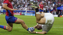 England's Henry Arundell scores one of his five tries during the Rugby World Cup against Chile.