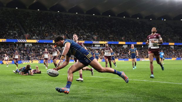 Bailey Simonsson of the Eels scores a try against Manlyin round 16 at CommBank Stadium.
