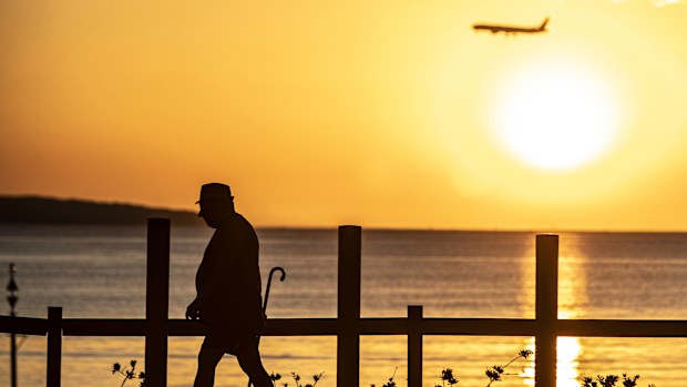 Early morning walkers are seen exercising in Brighton Le Sands, Sydney, Tuesday 28 January, 2025 ahead of an above average January summer day. Sydney is expecting a high of 40 degrees in the city today, with 42 degrees in the western suburbs. Photo: Sam Mooy / The Sydney Morning Herald