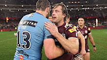 Isaah Yeo embraces Cameron Munster after game two of the 2025 State of Origin series. 
