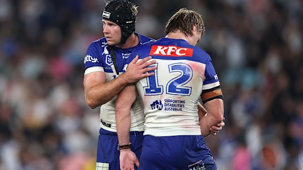 SYDNEY, AUSTRALIA - APRIL 09: Matt Burton and Jacob Preston of the Bulldogs acknowledge each other after the round six NRL match between the Canterbury Bulldogs and Penrith Panthers at Accor Stadium on April 09, 2026 in Sydney, Australia. (Photo by Cameron Spencer/Getty Images)