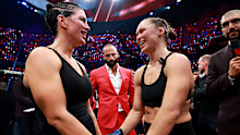 Ronda Rousey and Gina Carano embrace after their bout.