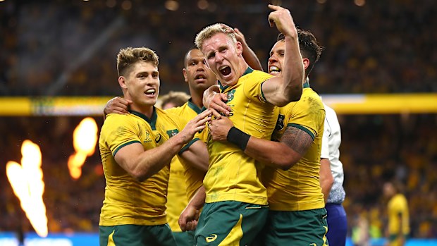 Reece Hodge celebrates a try at Optus Stadium.