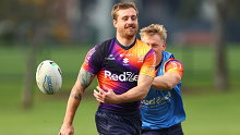 MELBOURNE, AUSTRALIA - MAY 10: Cameron Munster of the Storm passes the ball during a Melbourne Storm NRL media opportunity at Gosch's Paddock on May 10, 2024 in Melbourne, Australia. (Photo by Quinn Rooney/Getty Images)