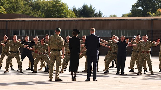 New Zealand troops perform a "Haka" for Prince William, Prince of Wales and Catherine, Princess of Wales.