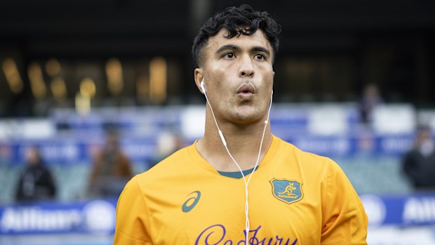 Joseph-Aukuso Suaalii of Australia warms up.