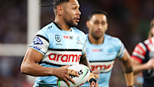 BRISBANE, AUSTRALIA - MAY 18: Jesse Ramien of the Sharks of  runs the ball during the round 11 NRL match between Cronulla Sharks and Sydney Roosters at Suncorp Stadium, on May 18, 2024, in Brisbane, Australia. (Photo by Hannah Peters/Getty Images)