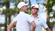 International Team Member Adam Scott of Australia celebrates with Cam Davis of Australia after making a putt during the Saturday afternoon Four-Ball Match Play of Presidents Cup at Quail Hollow September 24, 2022, in Charlotte, North Carolina. (Photo by Keyur Khamar/PGA TOUR via Getty Images)