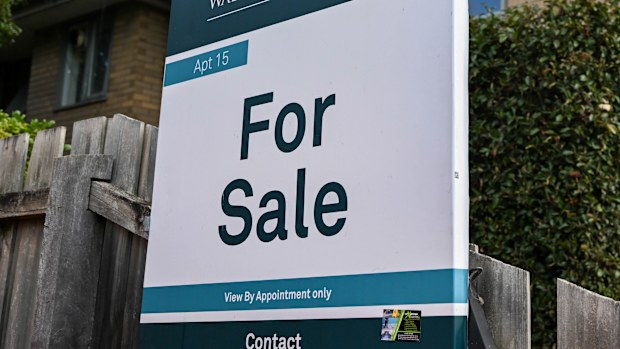 A for sale sign on a home.