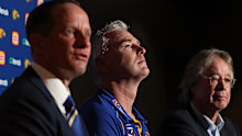 Adam Simpson looks on with Don Pyke and Paul Fitzpatrick during his final press conference.