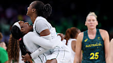 Elizabeth Balogun and Adebola Adeyeye of Nigeria celebrate victory.