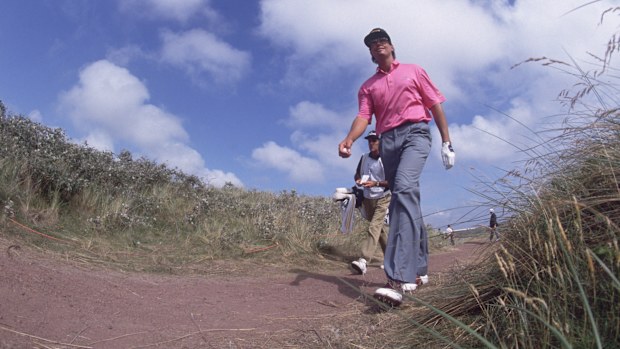 Australian golfer Ian Baker-Finch walks to the 18th tee before winning the British Open Championship at the Royal Birkdale golf course, 1991. (Photo by Simon Bruty/Getty Images)