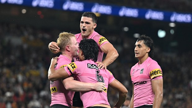 The Penrith Panthers celebrate a try.