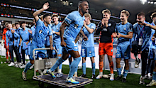 Douglas Costa celebrates Sydney FC's win. 