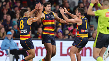 Adelaide Crows celebrate their win over Port Adelaide. 
