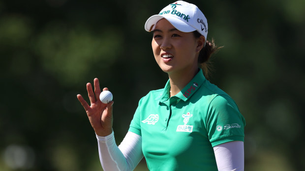 Minjee Lee of Australia acknowledges the crowd after a putt on the 11th green during the third round of the U.S. Women's Open Presented by Ally at Lancaster Country Club on June 01, 2024 in Lancaster, Pennsylvania. (Photo by Patrick Smith/Getty Images)