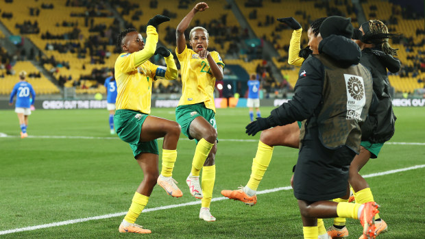 WELLINGTON, NEW ZEALAND - AUGUST 02: Thembi Kgatlana of South Africa celebrates with teammates after scoring her team's third goal during the FIFA Women's World Cup Australia & New Zealand 2023 Group G match between South Africa and Italy at Wellington Regional Stadium on August 02, 2023 in Wellington, New Zealand. (Photo by Lars Baron/Getty Images)