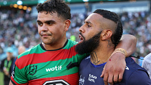 SYDNEY, AUSTRALIA - MARCH 29: Latrell Mitchell of the Rabbitohs and Josh Addo-Carr of the Bulldogs embrace following the round four NRL match between South Sydney Rabbitohs and Canterbury Bulldogs at Accor Stadium, on March 29, 2024, in Sydney, Australia. (Photo by Cameron Spencer/Getty Images)