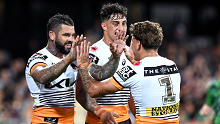 Broncos star Adam Reynolds is congratulated by teammates after scoring a try against the Eels in round eight.