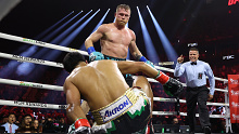 LAS VEGAS, NEVADA - MAY 04: Canelo Alvarez knocks down Jaime Munguia in their super middleweight championship title fight at T-Mobile Arena on May 04, 2024 in Las Vegas, Nevada. (Photo by Christian Petersen/Getty Images)