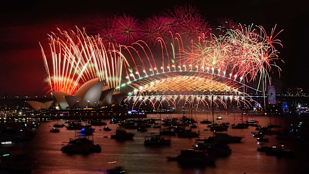 Fireworks light up the skies above Sydney Harbour at midnight on New Year's Eve. 31st December 2022 