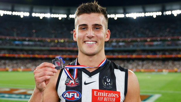 MELBOURNE, AUSTRALIA - APRIL 25: Nick Daicos of the Magpies poses for a photo after winning the Anzac medal during the 2023 AFL Round 06 match between the Collingwood Magpies and the Essendon Bombers at the Melbourne Cricket Ground on April 25, 2023 in Melbourne, Australia. (Photo by Dylan Burns/AFL Photos)
