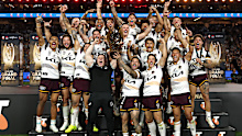 The Broncos lift the Provan-Summons Trophy. 