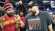 BALTIMORE, MARYLAND - JANUARY 28: Travis Kelce #87 of the Kansas City Chiefs celebrates with his brother Jason Kelce after a 17-10 victory against the Baltimore Ravens in the AFC Championship Game at M&T Bank Stadium on January 28, 2024 in Baltimore, Maryland. (Photo by Rob Carr/Getty Images)