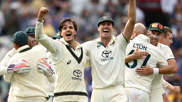 Sam Konstas and Pat Cummins celebrate at the MCG.