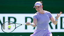 INDIAN WELLS, CALIFORNIA - MARCH 10: Talia Gibson of Australia returns a shot to Jasmine Paolini of Italy during Day 7 of the BNP Paribas Open at the Indian Wells Tennis Garden on March 10, 2026 in Indian Wells, California. (Photo by Matthew Stockman/Getty Images)