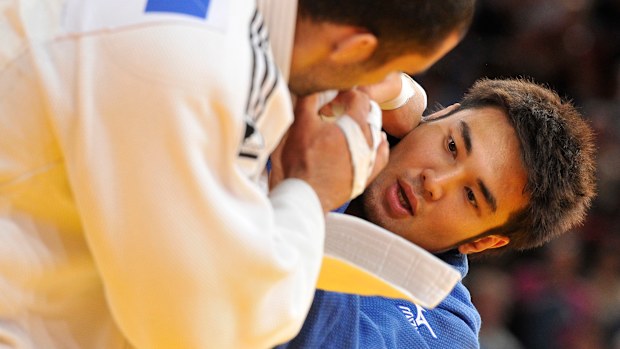 Kayhan Takagi (in blue) in action.