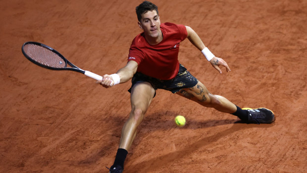 Thanasi Kokkinakis of Australia plays a forehand against Taylor Fritz of United States in the Men's Singles third round match during Day Seven of the 2024 French Open at Roland Garros on June 01, 2024 in Paris, France. (Photo by Dan Istitene/Getty Images)