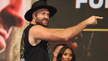 LAS VEGAS, NEVADA - OCTOBER 08:  WBC heavyweight champion Tyson Fury taunts  Deontay Wilder  during his official weigh-in at MGM Grand Garden Arena on October 8, 2021 in Las Vegas, Nevada. Fury will defend his title against Deontay Wilder on October 9 at T-Mobile Arena in Las Vegas.  (Photo by Al Bello/Getty Images)