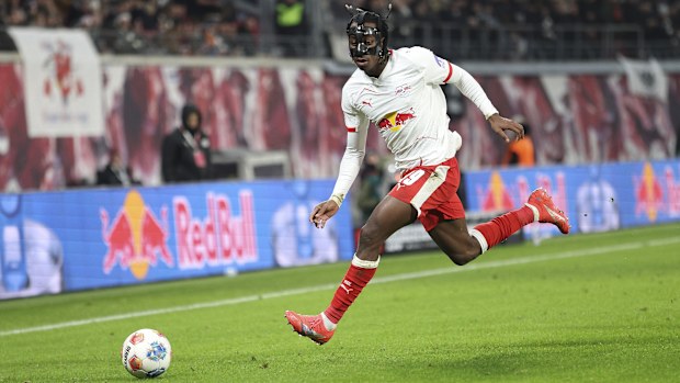 Yan Diomande of RB Leipzig controls the ball during the Bundesliga match between RB Leipzig and Eintracht Frankfurt at Red Bull Arena on December 06, 2025 in Leipzig, Germany. (Photo by Maja Hitij/Getty Images)