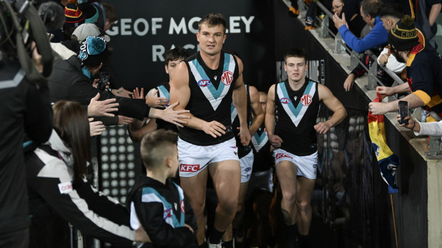  Ollie Wines of Port Adelaide leads his team out during the round 20 AFL match between Adelaide Crows and Port Adelaide Power at Adelaide Oval, on July 29, 2023, in Adelaide, Australia. (Photo by Mark Brake/Getty Images)