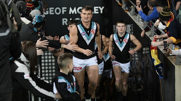  Ollie Wines of Port Adelaide leads his team out during the round 20 AFL match between Adelaide Crows and Port Adelaide Power at Adelaide Oval, on July 29, 2023, in Adelaide, Australia. (Photo by Mark Brake/Getty Images)