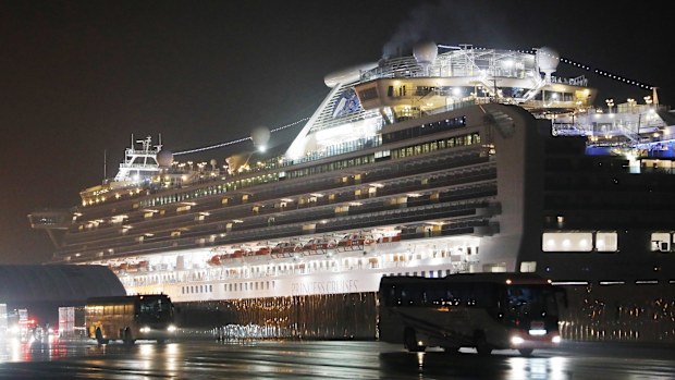 Buses of the Japan Self Defence Forces leave Daikoku Futo Wharf where the Diamond Princess is anchored in Yokohama. Approximately 380 US passengers hopped on buses to go to Haneda International Airport to board two chartered flights by US government. 