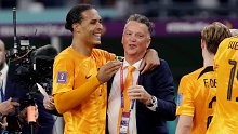 Virgil van Dijk with Netherlands coach Louis van Gaal, celebrating victory after their round of 16 World Cup clash with Qatar.