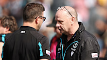 Ken Hinkley addresses Josh Carr.