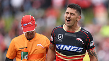 SYDNEY, AUSTRALIA - JUNE 30: Jeremy Marshall-King of the Dolphins is assisted from the field after sustaining a injury during the round 17 NRL match between St George Illawarra Dragons and Dolphins at Netstrata Jubilee Stadium on June 30, 2024 in Sydney, Australia. (Photo by Jason McCawley/Getty Images)