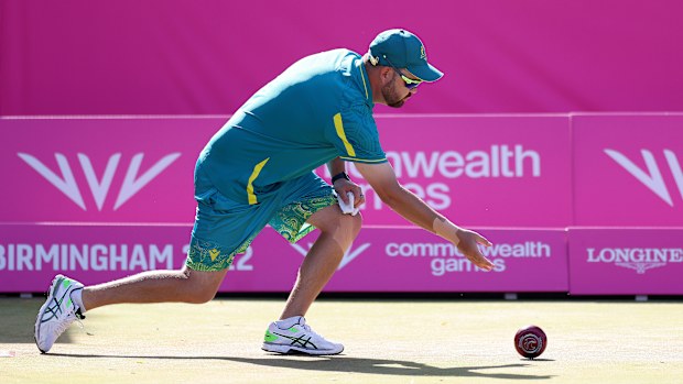 Australia's Aaron Wilson bowls during men's singles gold medal match between Australia and Northern Ireland at the Birmingham 2022 Commonwealth Games.