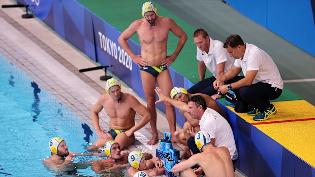 Australia coach Elvis Fatovic  talks to his team during the match against Montenegro.