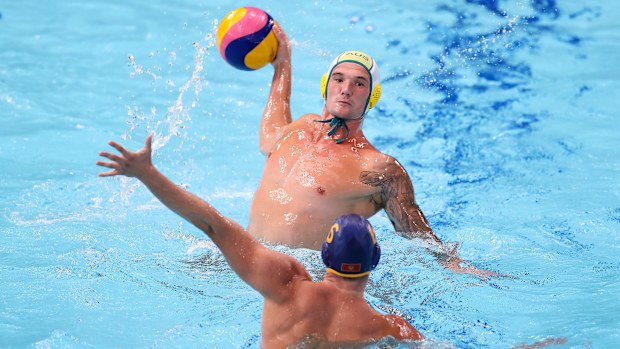 Australia's Aaron Younger prepares to shoot against Montenegro.