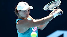 Ash Barty plays a backhand during a practice session during day six of the 2022 Australian Open. 